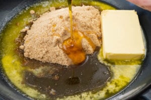 Butter, brown sugar and syrup in a cast iron pan